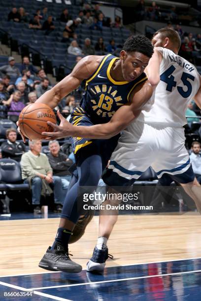 Ike Anigbogu of the Indiana Pacers handles the ball against the Minnesota Timberwolves on October 24, 2017 at Target Center in Minneapolis,...