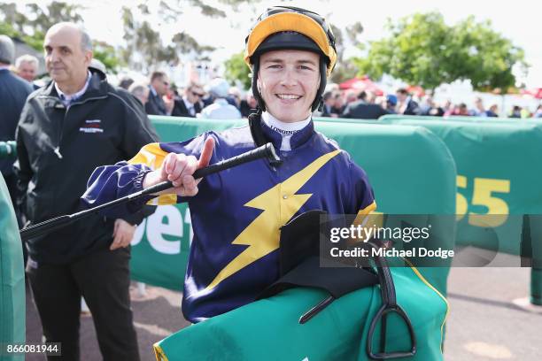 Vengeur Masque jockey Patrick Moloney poses after winning race 7 the bet365 Geelong Cup ahead of Craig Williams riding Gallic Chieftain during...