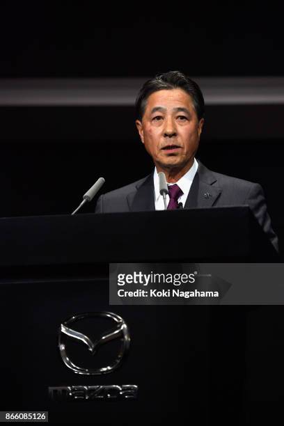 Mazda Motor Co CEO Masamichi Kogai speaks during a press conference at the Mazda Motor Co booth during the Tokyo Motor Show at Tokyo Big Sight on...