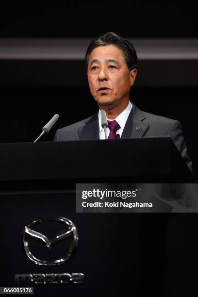 Mazda Motor Co CEO Masamichi Kogai speaks during a press conference at the Mazda Motor Co booth during the Tokyo Motor Show at Tokyo Big Sight on...