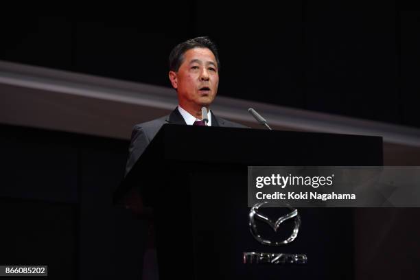 Mazda Motor Co CEO Masamichi Kogai speaks during a press conference at the Mazda Motor Co booth during the Tokyo Motor Show at Tokyo Big Sight on...