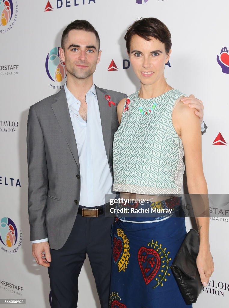 Quinn Tivey and Naomi Wilding attend The Elizabeth Taylor AIDS... News