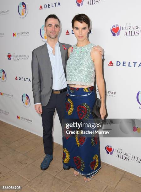 Quinn Tivey and Naomi Wilding attend The Elizabeth Taylor AIDS Foundation and mothers2mothers dinner at Ron Burkle's Green Acres Estate on October...