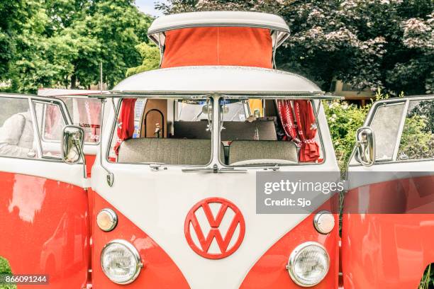 volkswagen transporter t1 camper van in a park - volkswagen bus stock pictures, royalty-free photos & images