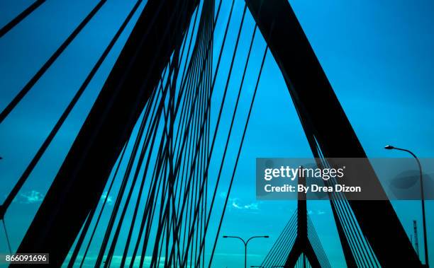 silhouette of bunker hill memorial bridge - zakim bridge stock pictures, royalty-free photos & images