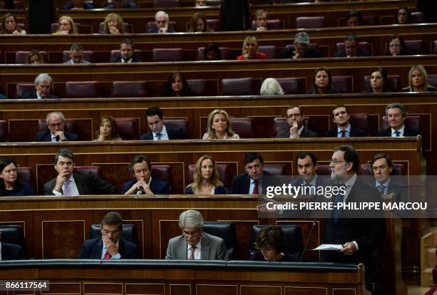 Spain's Prime Minister Mariano Rajoy gives a speech during a session of the Lower House of Parliament in Madrid on October 25, 2017. Spain ramped up...