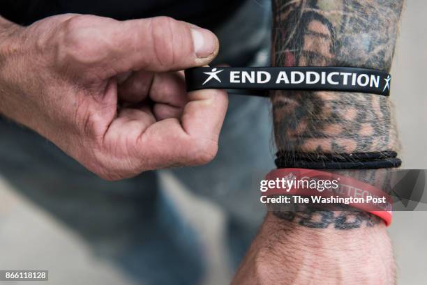 August 15, 2017: Richard Long shows off one of his bracelets outside of his recovery center on Tuesday, August 15, 2017. Richard has been clean for...
