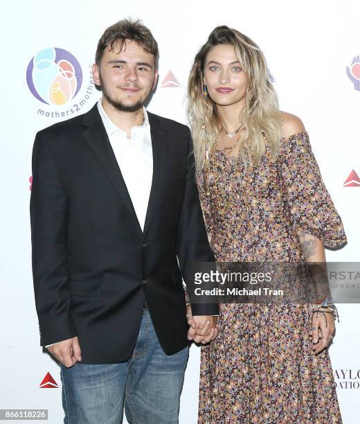 Prince Jackson and Paris Jackson attend the mothers2mothers and ETAF event held on October 24, 2017 in Beverly Hills, California.