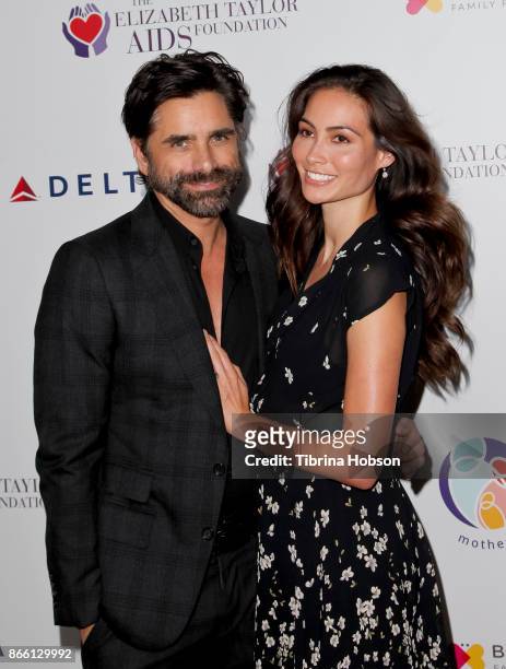 John Stamos and Caitlin McHugh attend the mothers2mothers and The Elizabeth Taylor AIDS Foundation Benefit Dinner on October 24, 2017 in Beverly...