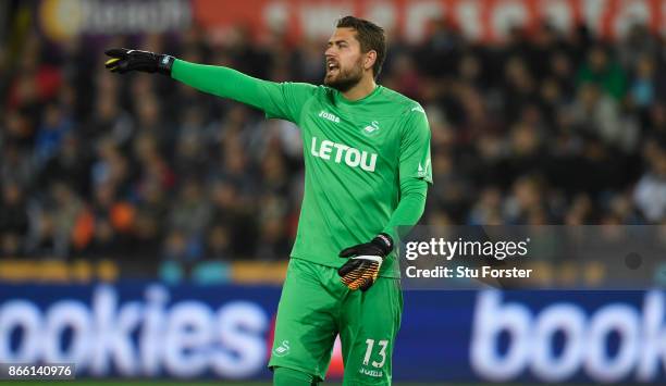 Kristoffer Nordfeldt of Swansea in action during the Carabao Cup Fourth Round match between Swansea City and Manchester United at Liberty Stadium on...