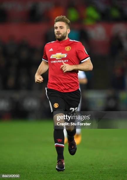 Luke Shaw of United in action during the Carabao Cup Fourth Round match between Swansea City and Manchester United at Liberty Stadium on October 24,...