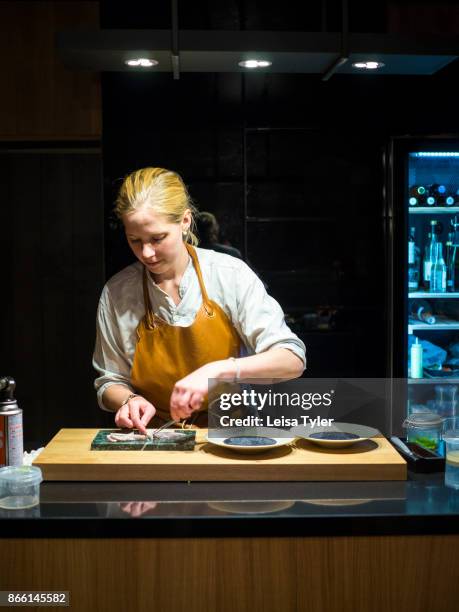 Pai Holmberg from Bifångst, a two seat restaurant in Gothenberg. Ms Holmberg carries a no-waste moto in her tiny kitchen, using second grade fish and...