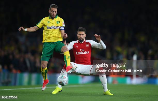 Ivo Pinto of Norwich City and Olivier Giroud of Arsenal during the Carabao Cup Fourth Round match between Arsenal and Norwich City at Emirates...