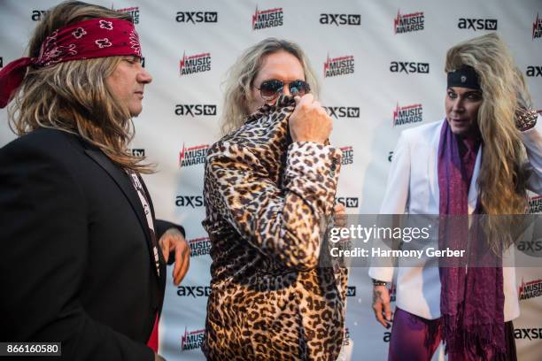 Stix Zadina, Michael Starr and Lexxi Foxx of the band Steel Panther attend the Loudwire Music Awards at The Novo by Microsoft on October 24, 2017 in...