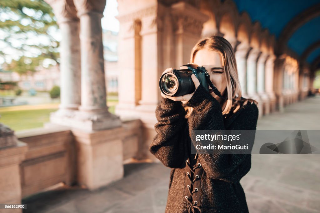Using Dslr Camera Woman Using Dslr Camera High-Res Stock Photo - Getty Images