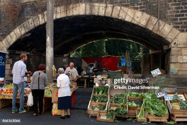 Fresh fruit and vegetables on sale at a produce stall at La Pescheria, the local fish market, on September 26, 2017 in Catania on the Italian island...