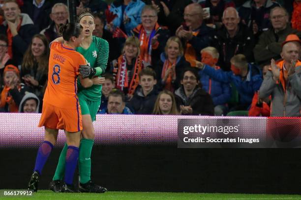 Sari van Veenendaal of Holland Women stops a penalty and celebrates it with Sherida Spitse of Holland Women during the World Cup Qualifier Women...