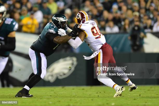 Philadelphia Eagles offensive tackle Jason Peters blocks Washington Redskins outside linebacker Preston Smith during a NFL football game between the...