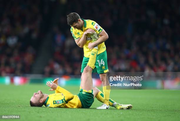 Tom Trybull of Norwich City gets cramp during Carabao Cup 4th Round match between Arsenal and Norwich City at Emirates Stadium, London, England on 24...