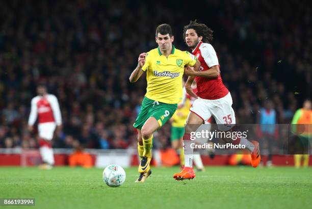 Nelson Oliveira of Norwich City gets browght downArsenal's Mohamed Elneny during Carabao Cup 4th Round match between Arsenal and Norwich City at...