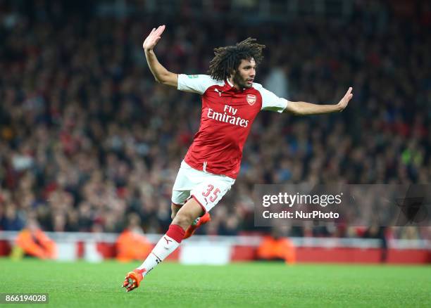 Nelson Oliveira of Norwich City gets browght downArsenal's Mohamed Elneny during Carabao Cup 4th Round match between Arsenal and Norwich City at...