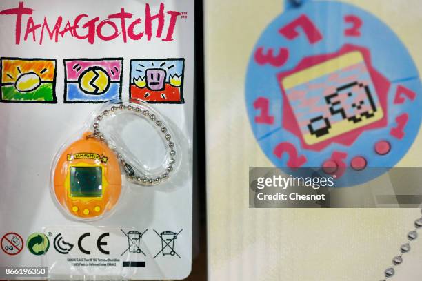 Tamagotchi" electronic pet toy is displayed in a toy store on October 25, 2017 in Paris, France. Tamagotchi is a virtual electronic animal which...