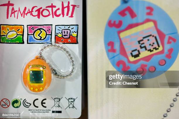 Tamagotchi" electronic pet toy is displayed in a toy store on October 25, 2017 in Paris, France. Tamagotchi is a virtual electronic animal which...