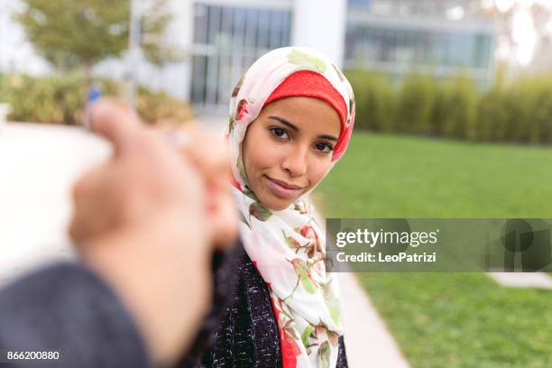 happy young muslim women - moroccan culture stock pictures, royalty-free photos & images