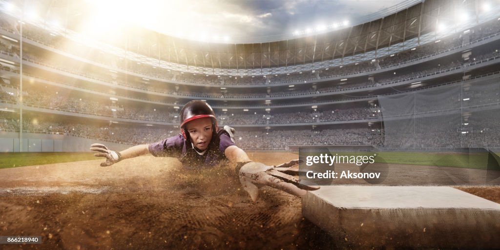 Softball female player on a professional arena