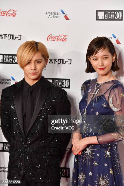 Actress Tsubasa Honda and actor Ryosuke Yamada arrive at the red carpet of the 30th Tokyo International Film Festival at Roppongi Hills on October...