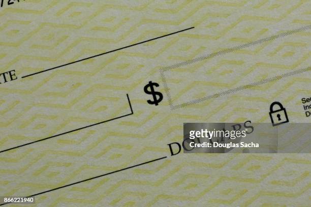 blank monetary cheque used as a bill of exchange - us paper currency stock pictures, royalty-free photos & images