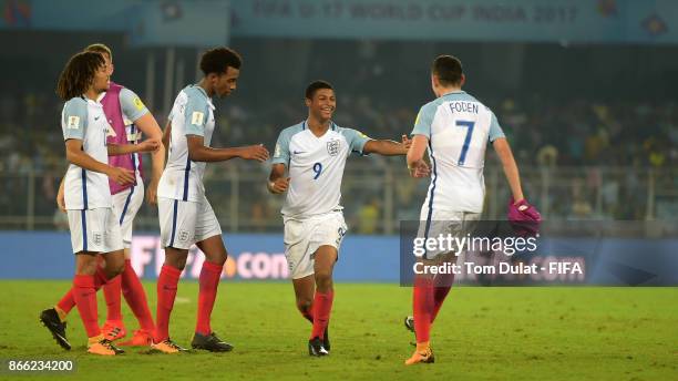 Rhian Brewster of England celebrates with the team winning the FIFA U-17 World Cup India 2017 Semi Final match between Brazil and England at...