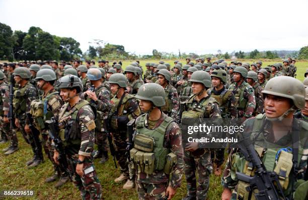 Philippine soldiers are lined up during their send off ceremony in Marawi, Lanao del Sur in the Southern Philippines on October 25, 2017. The...