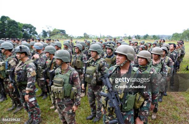 Philippine soldiers are lined up during their send off ceremony in Marawi, Lanao del Sur in the Southern Philippines on October 25, 2017. The...