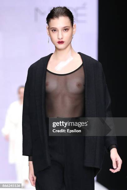 Model walks the runway at the Best Diploma Collections by CPD Course 'Fashion Design', British Higher School of Art and Design fashion show during...