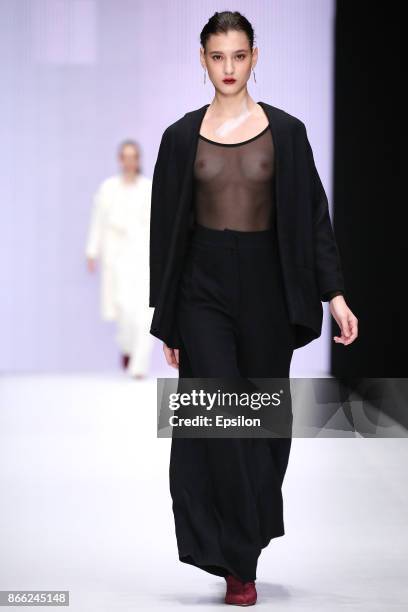 Model walks the runway at the Best Diploma Collections by CPD Course 'Fashion Design', British Higher School of Art and Design fashion show during...