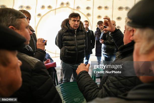 Mikheil Saakashvili talks to people inside a tent in camp in Kyiv, Ukraine, Oct.25, 2017. Dozens Ukrainians set up a tent camp in front of Parliament...