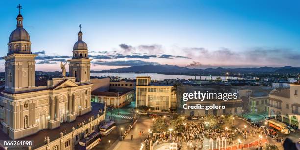 panoramic view over santiago de cuba bay with cathedral and harbour - santiago de cuba stock pictures, royalty-free photos & images