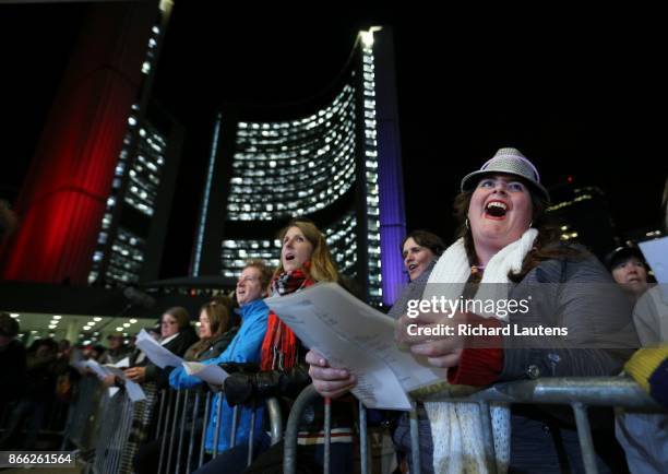 Toronto, ON - OCTOBER, 24 The Toronto-based singalong collective Choir! Choir! Choir! held a gathering at Nathan Phillips Square to have a massed...