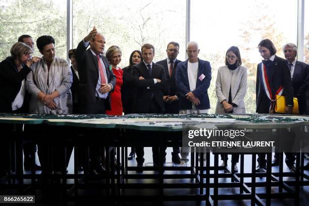 French President Emmanuel Macron , President of the Paris-Sud University Sylvie Retailleau , French Minister of Higher Education, Research and...