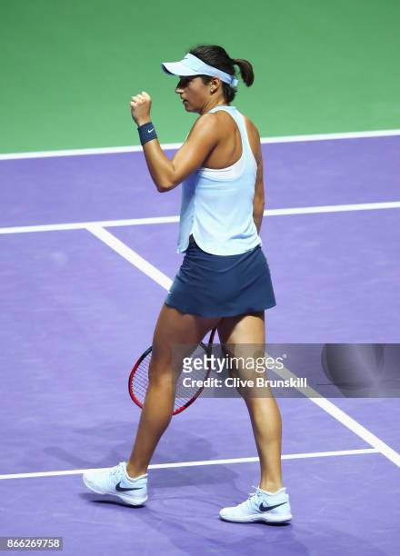 Caroline Garcia of France celebrates a point in her singles match against Elina Svitolina of Ukraine during day 4 of the BNP Paribas WTA Finals...
