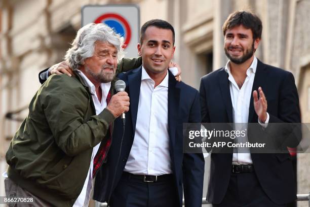 Leaders of the anti-establishment Five Star Movement Beppe Grillo , Luigi Di Maio and Alessandro Di Battista address supporters during a protest near...