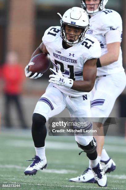 Justin Jackson Northwestern Wildcats runs with the ball during a college football game against the Maryland Terrapins at Capitol One Field on October...