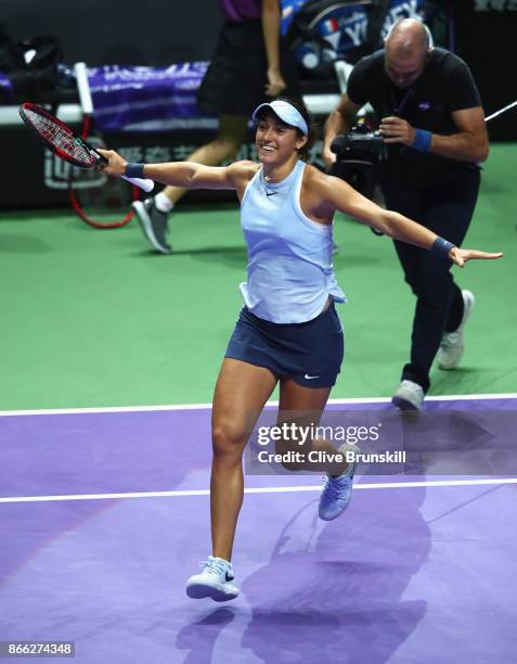 Caroline Garcia of France celebrates victory in her singles match against Elina Svitolina of Ukraine during day 4 of the BNP Paribas WTA Finals...