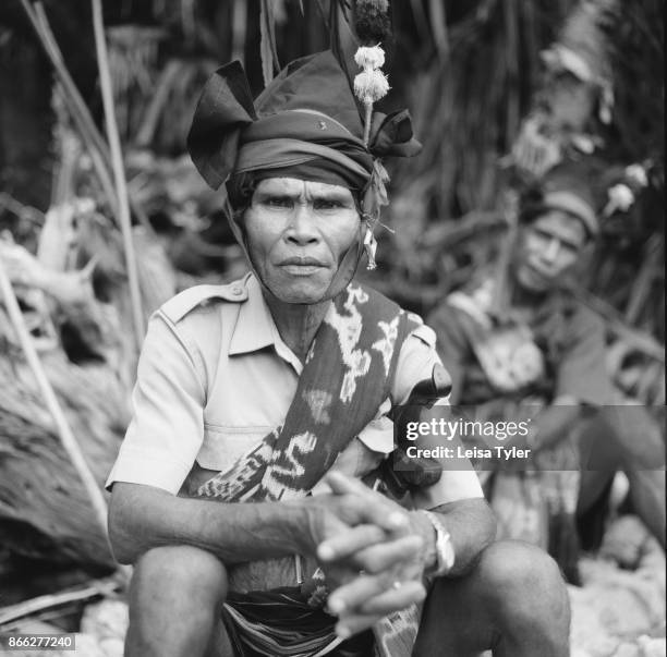 Medicine man waiting for the annual worms to come ashore and herald the beginning of the Pasola horseback festival in Sumba Island, Indonesia. The...