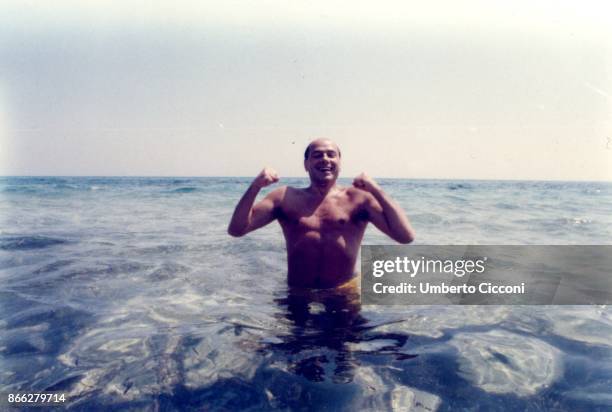 Silvio Berlusconi at the beach in Hammamet in Tunisia in August 1984. He was at the beach with Bettino Craxi and Fedele Confalonieri.