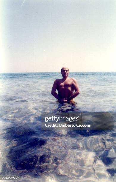 Silvio Berlusconi at the beach in Hammamet in Tunisia in August 1984. He was at the beach with Bettino Craxi and Fedele Confalonieri.