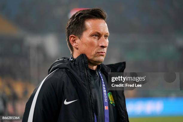 Head coach of Beijing Guoan Roger Schmidt reacts during the Chinese Super League match between Beijing Guoan FC and ChongQing Dangdai Lifan FC at...