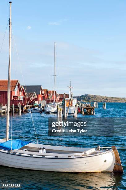 Boathouses line the seafront at Grebbestad, West Sweden.