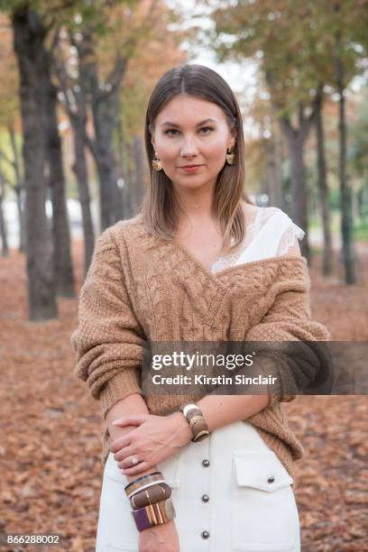 Fashion blogger Angelica Ardasheva wears a Mes Demoiselles sweater, ASOS top, Forever21 skirt day 2 of Paris Womens Fashion Week Spring/Summer 2018,...